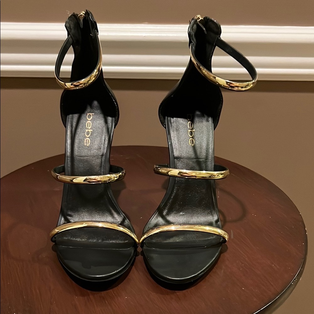 Bebe Black and Gold Stiletto Heels